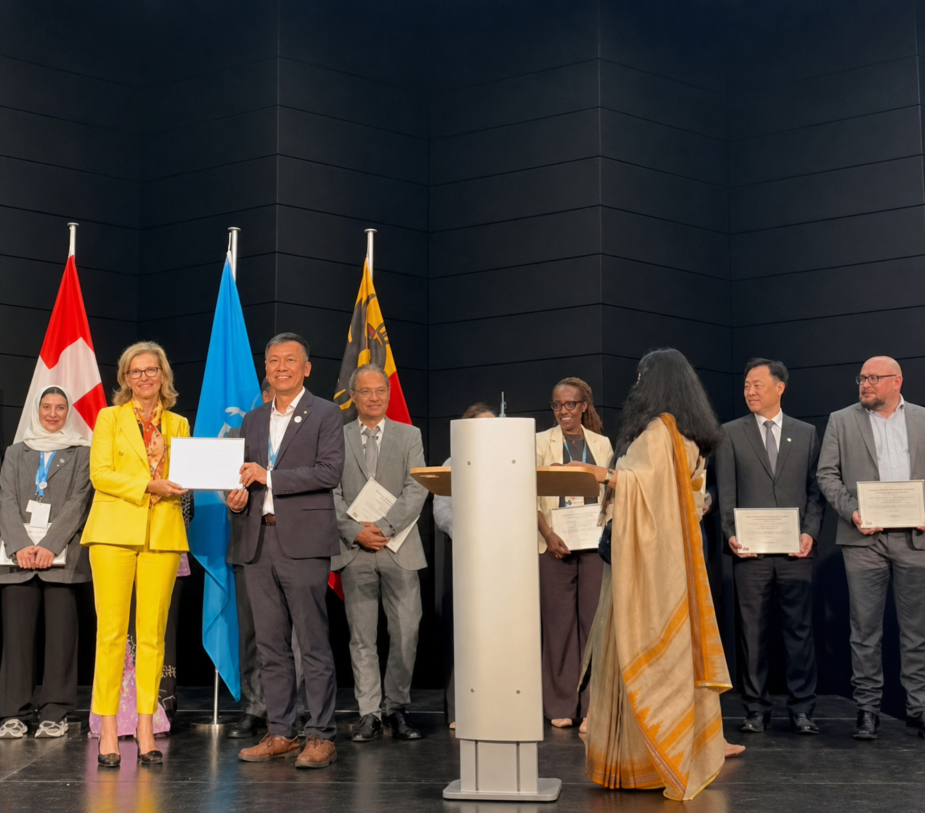 Delegates receive certificates during the WSIS Forum 2026 ceremony.