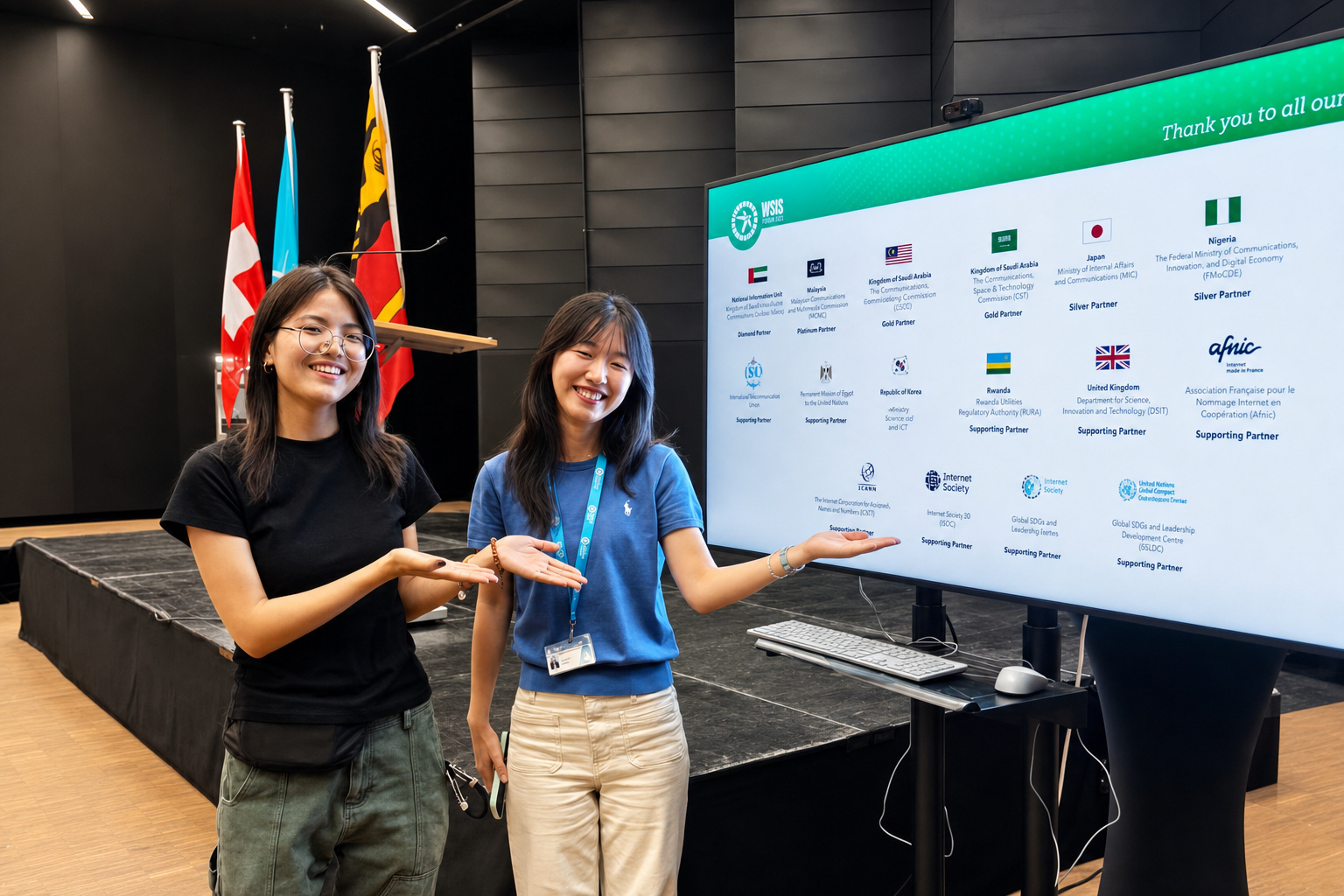 Two participants present the WSIS Forum 2026 partner display at the ceremony.