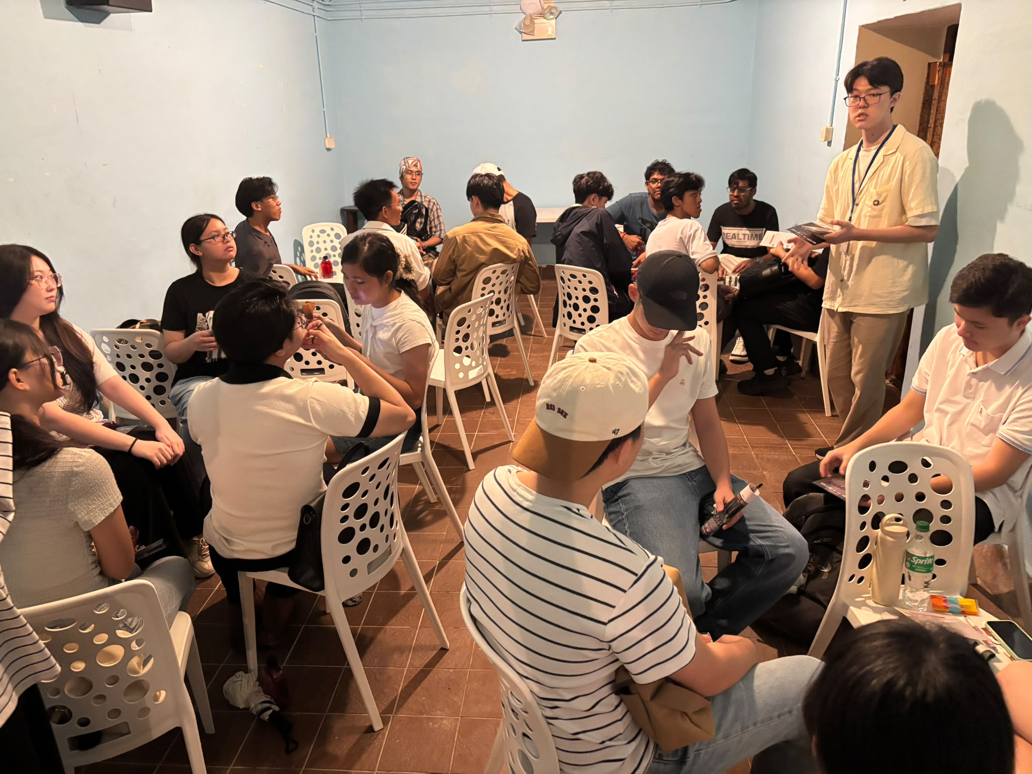 Young participants exchange ideas during the History to Today group discussion.