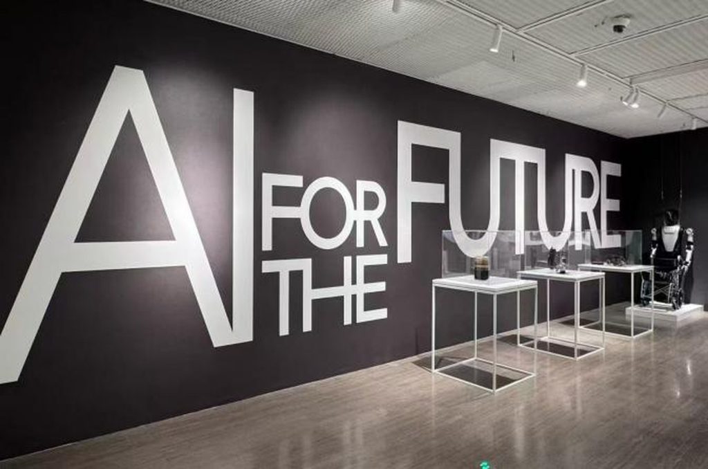 The AI FOR THE FUTURE flagship exhibition entrance and installation at the 2026 World Artificial Intelligence Conference in Shanghai, featuring minimalist vitrines and robotic technology.