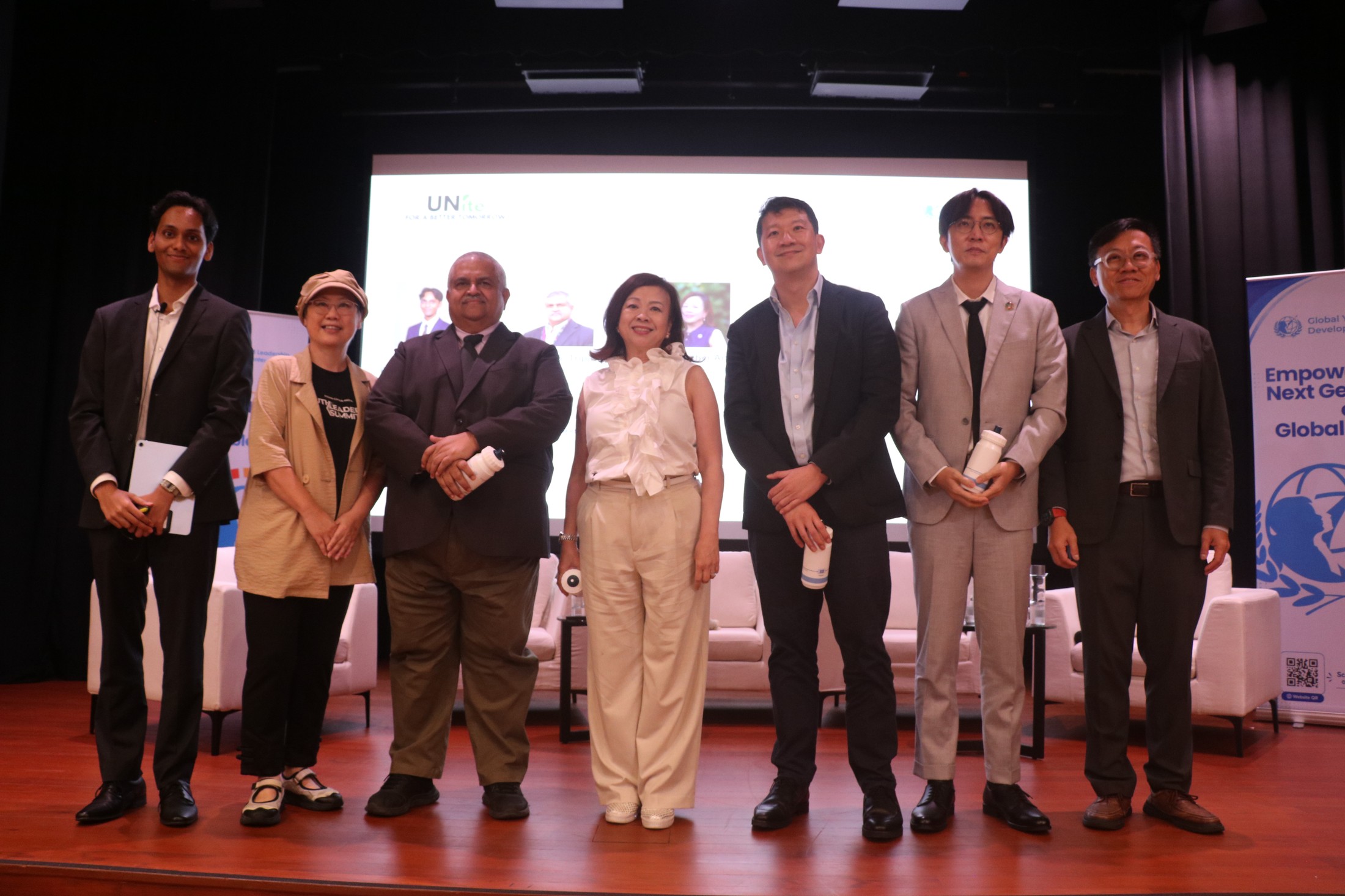 Distinguished speakers and lead organisers on stage at the Ngee Ann Auditorium, Asian Civilisations Museum during UNite For A Better Tomorrow: UNlocking Green Finance For Green Economy.